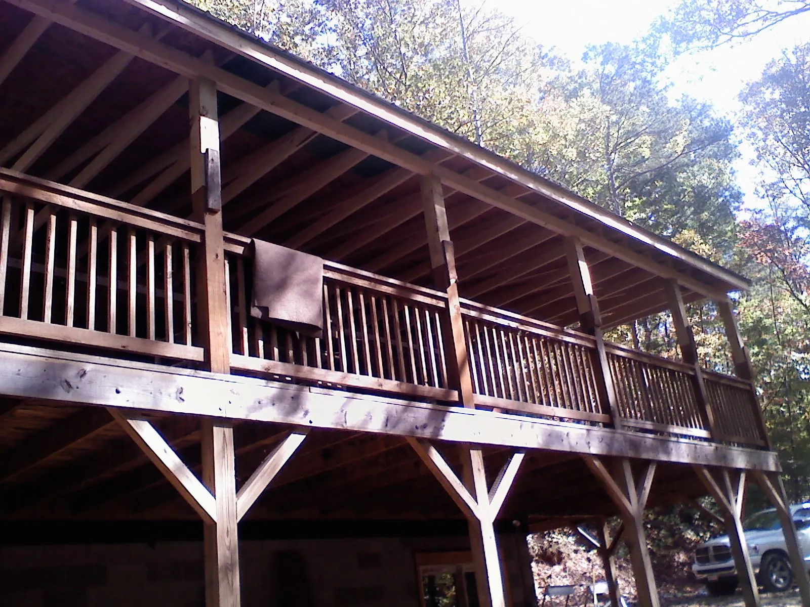 Timber framing under a new elevated porch and deck — Roof Leak Repair in Center Barnstead by Roofing Brothers